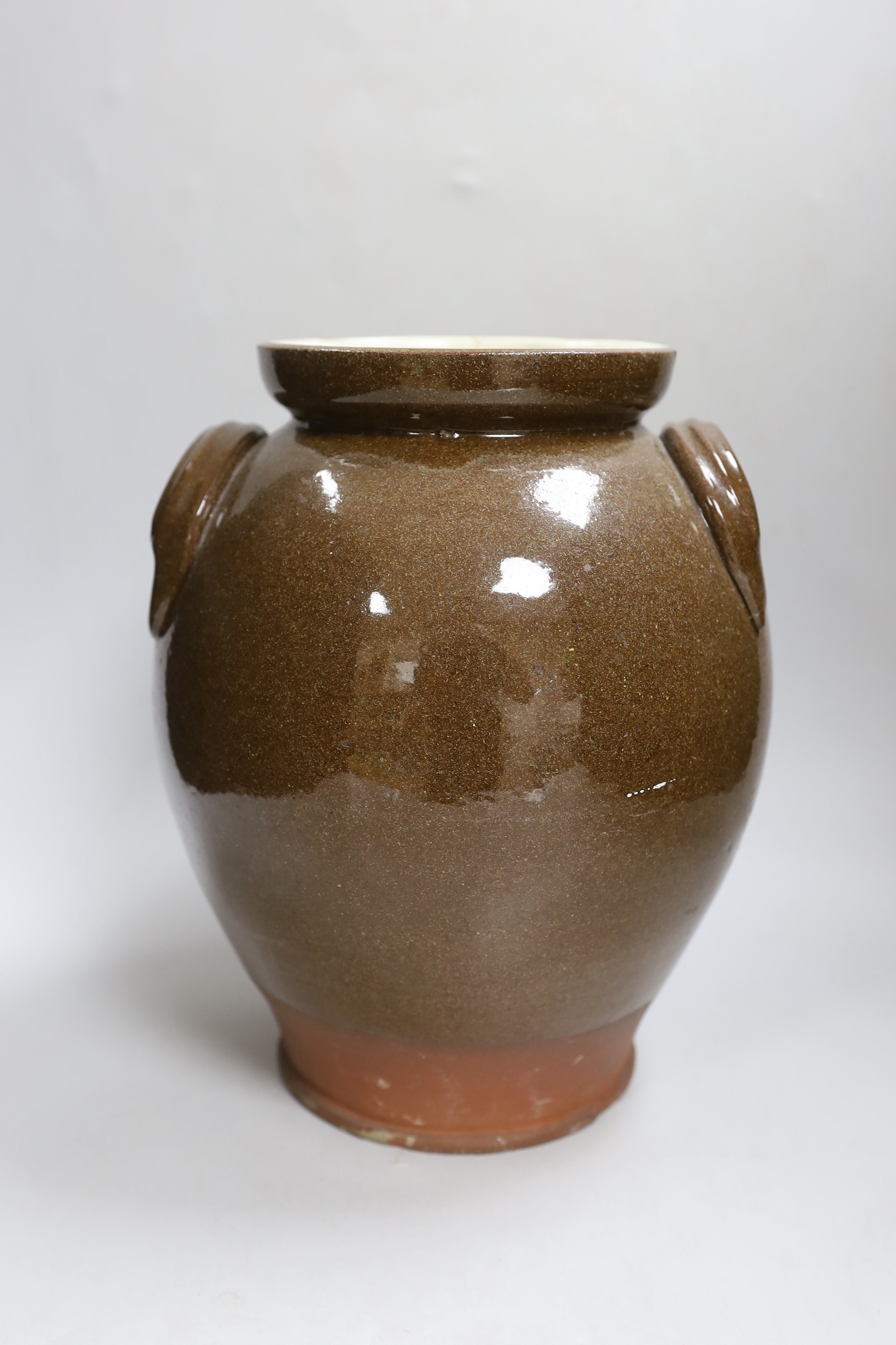 An early 20th century pottery jar inscribed ‘Flour B’, 30cm high